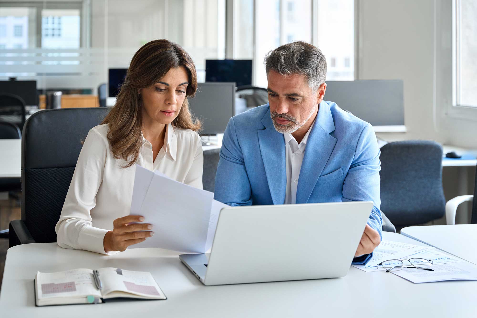 professionals discussing financial data