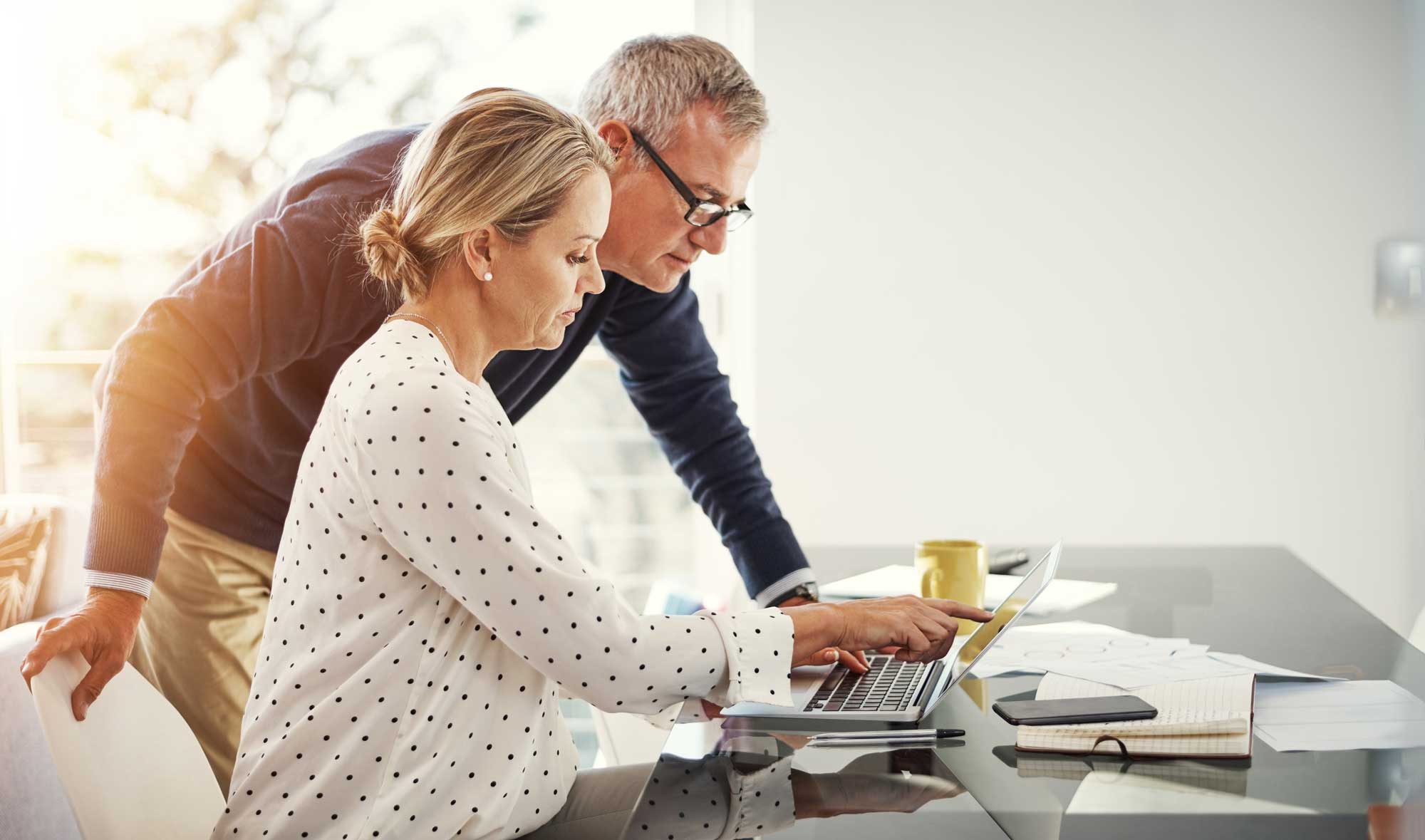 mature couple looking at finances